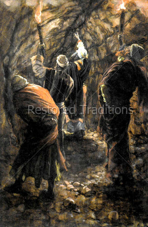 men in cave with torches