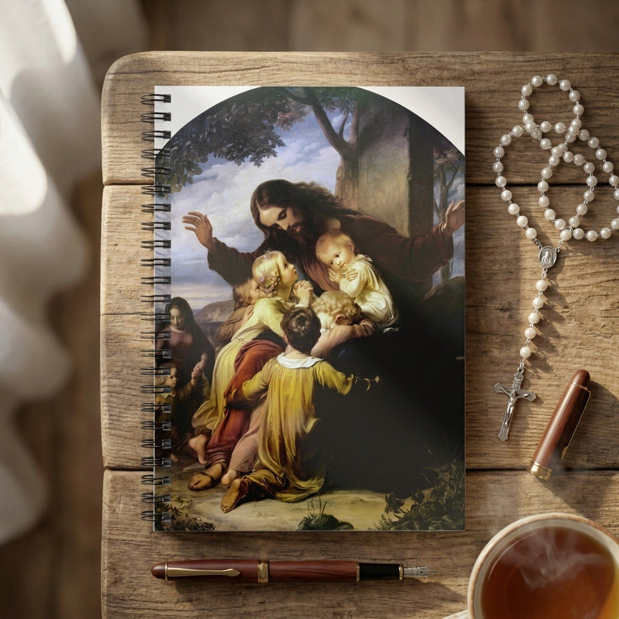 Madonna and Child prayer journal on a prayer table with a candle and rosary