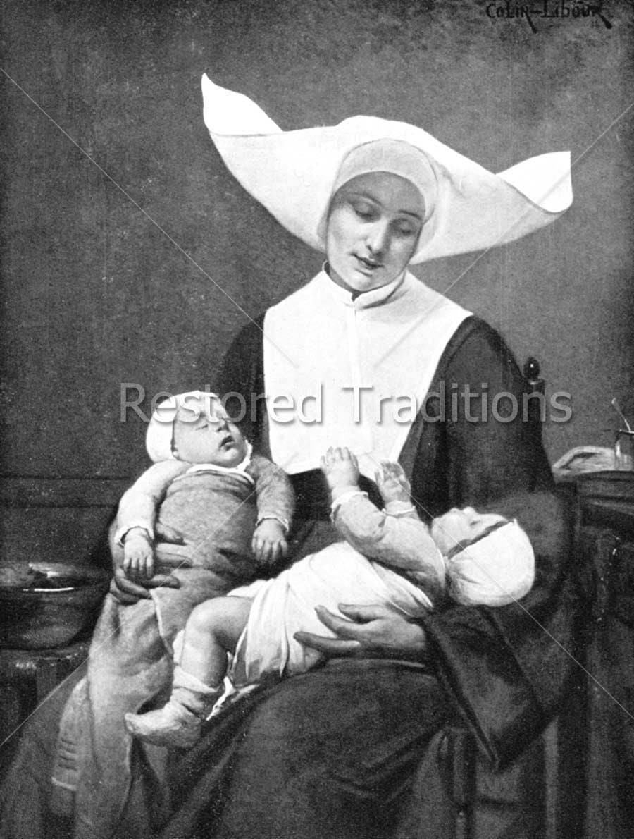 Religious Sister Holds Babies