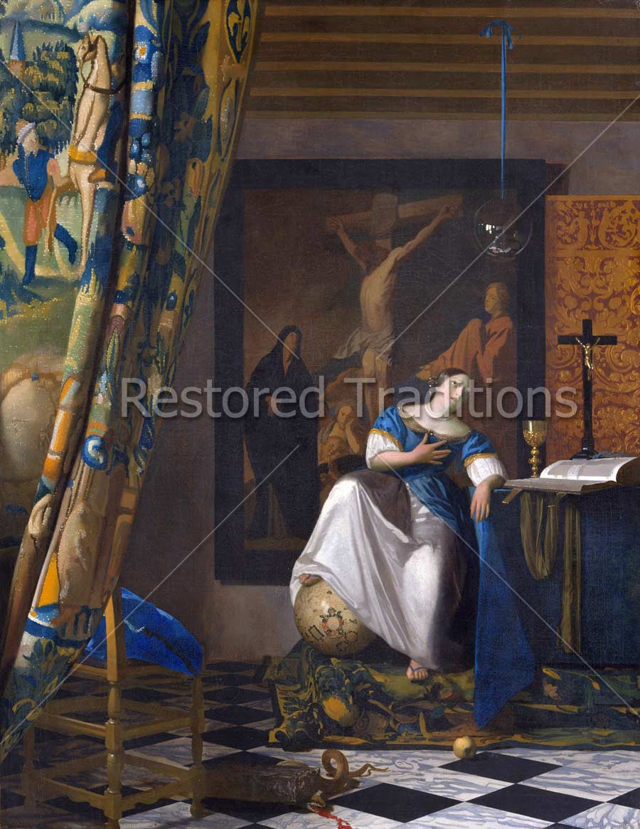 Woman sitting and looking a crucifix